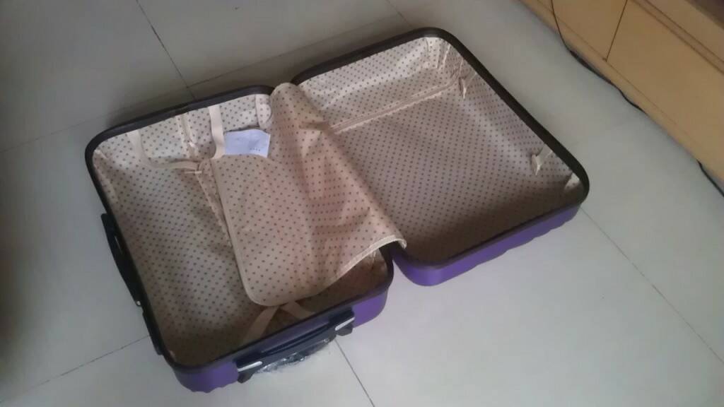 24寸行李箱可以放下主机吗